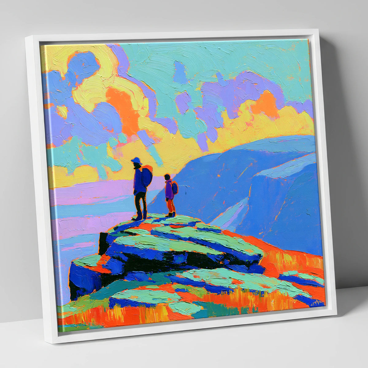 Hikers on a Vibrant Fell Summit lake district fell canvas wall art in white frame