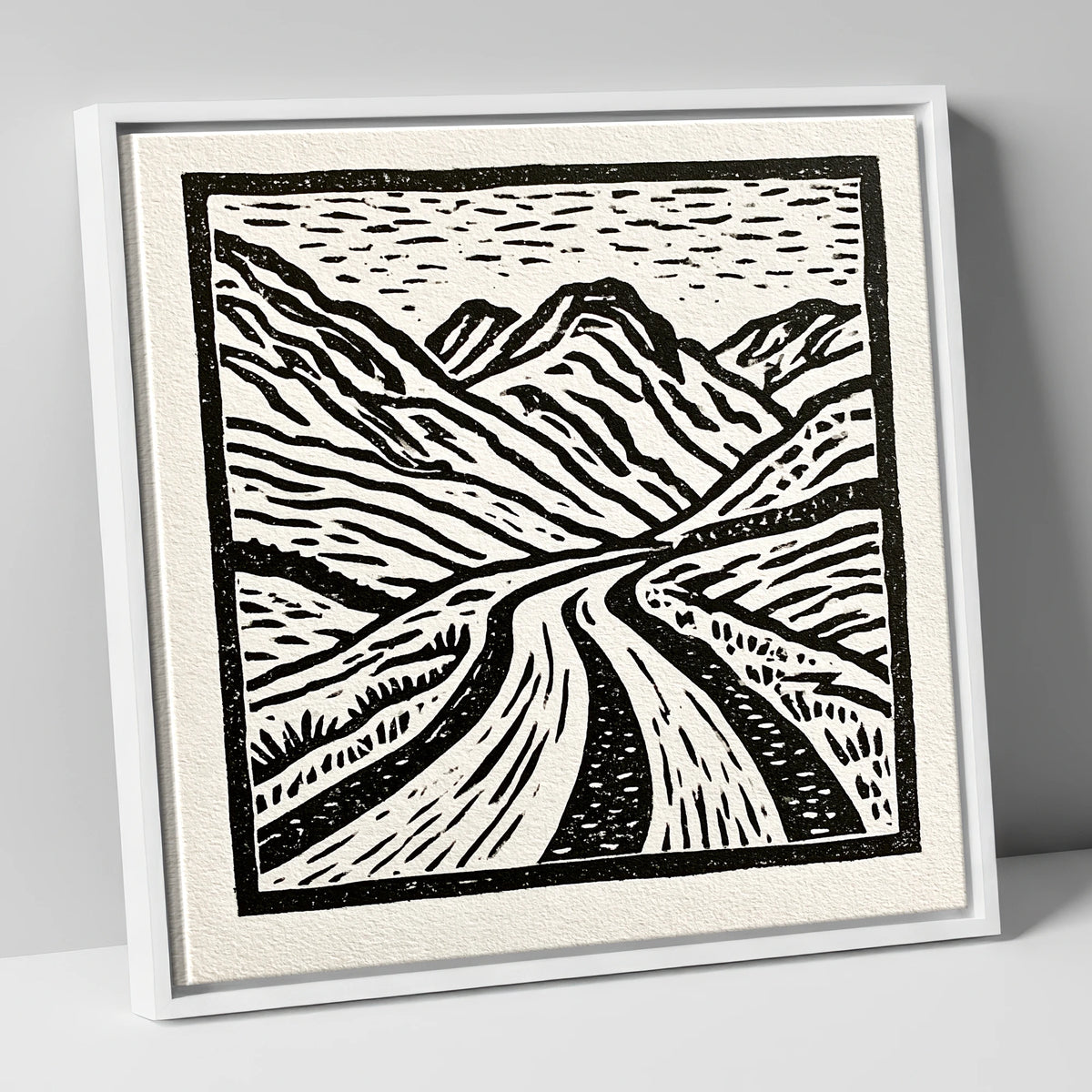 Hardknott Pass in Stark Monochrome lake district valley canvas wall art in white frame