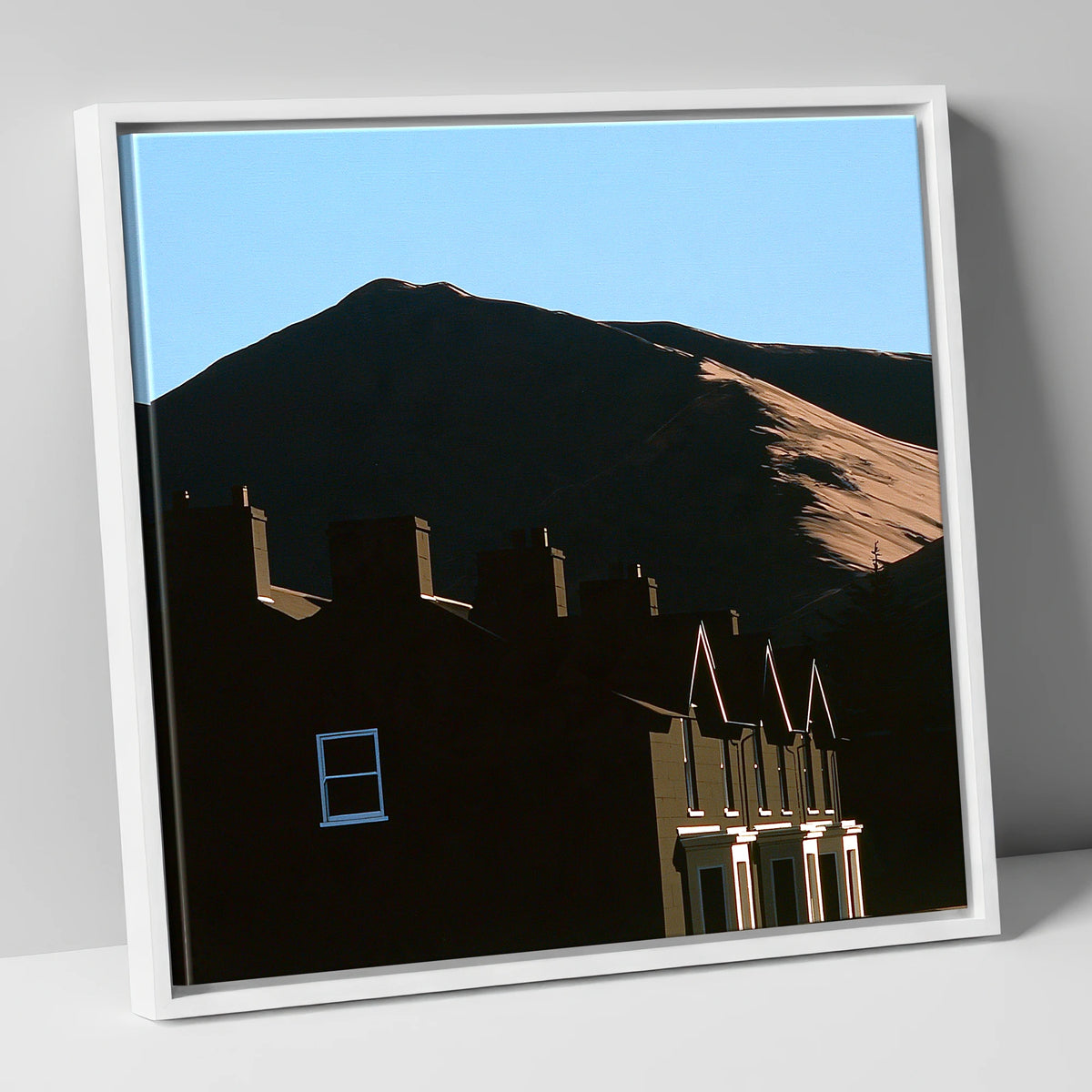 Silhouetted Keswick Terraces Beneath Skiddaw lake district village canvas wall art in white frame