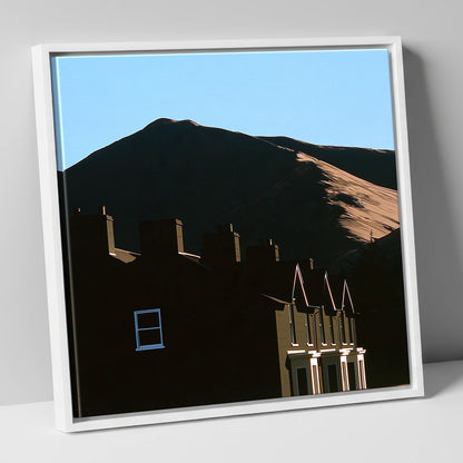 Silhouetted Keswick Terraces Beneath Skiddaw lake district village canvas wall art in white frame
