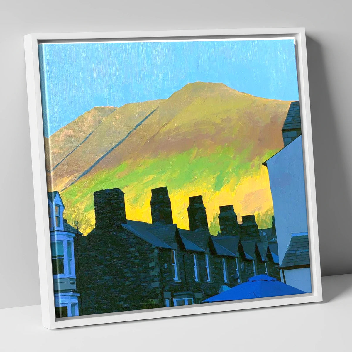 Keswick Chimneys and Sunlit Skiddaw lake district village canvas wall art in white frame
