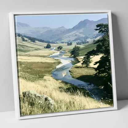 Winding River Beneath Hazy Fells lake district waterfall canvas wall art in white frame