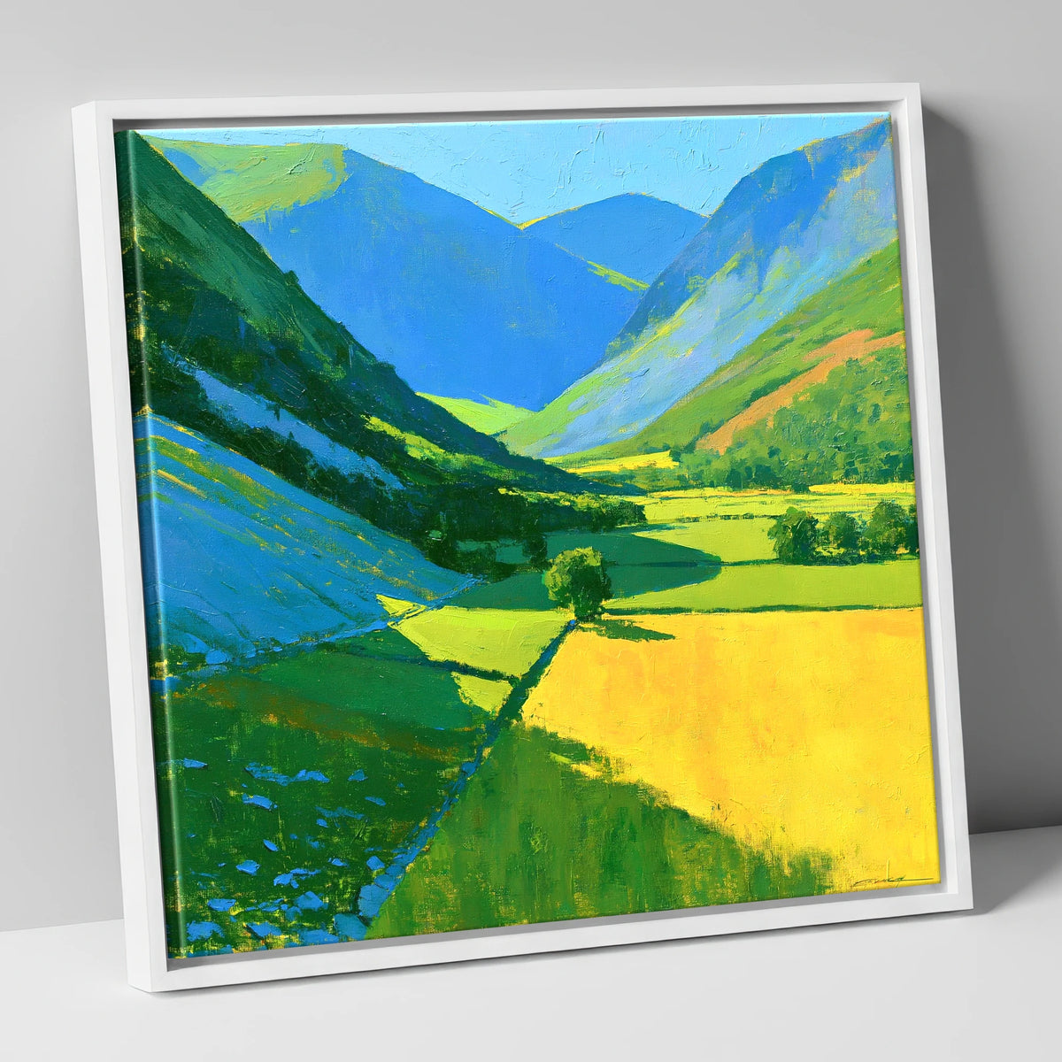 Vibrant Sunlit Valley with Blue Fellside Shadows lake district valley canvas wall art in white frame