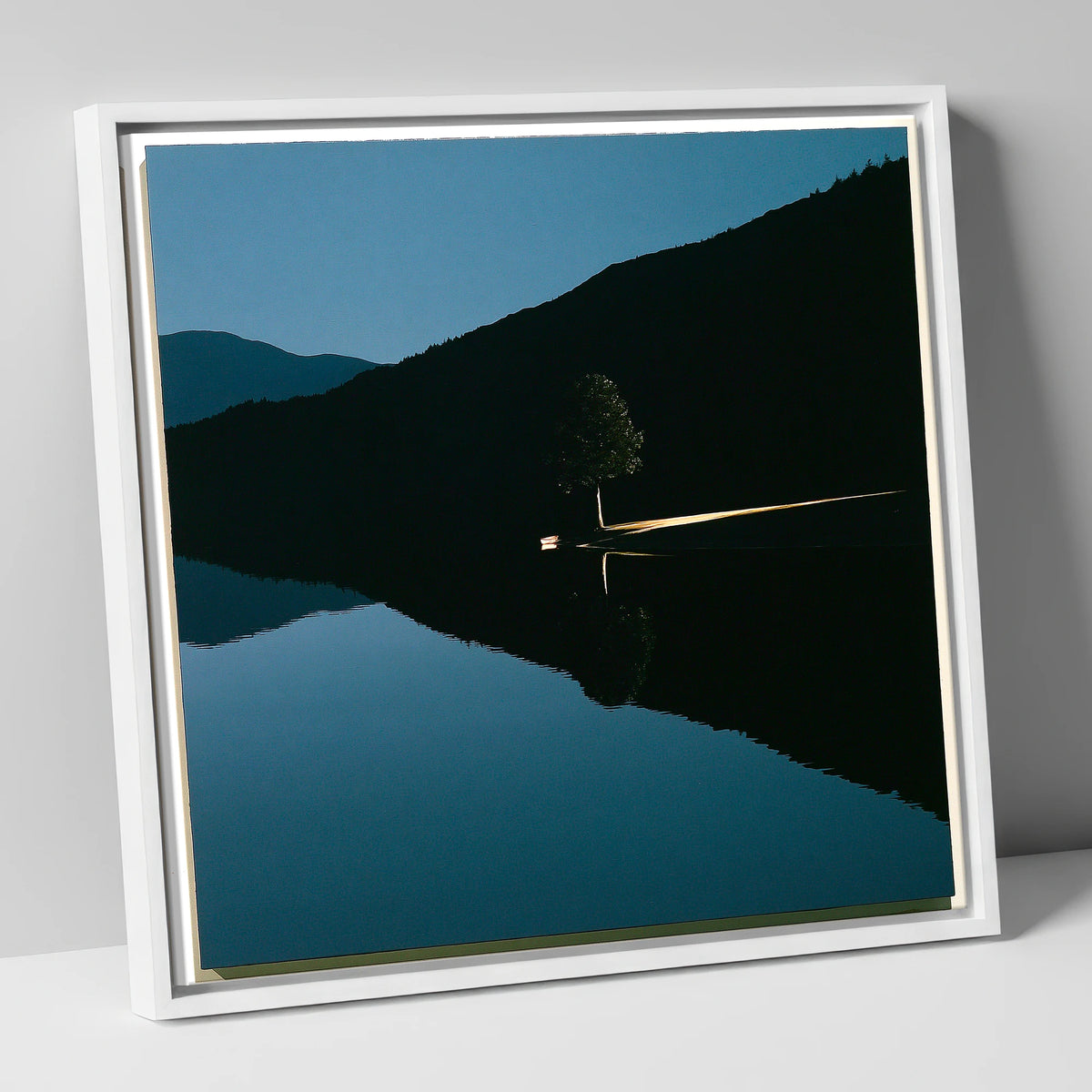 Illuminated Shore on Calm Lake lake district lake canvas wall art in white frame