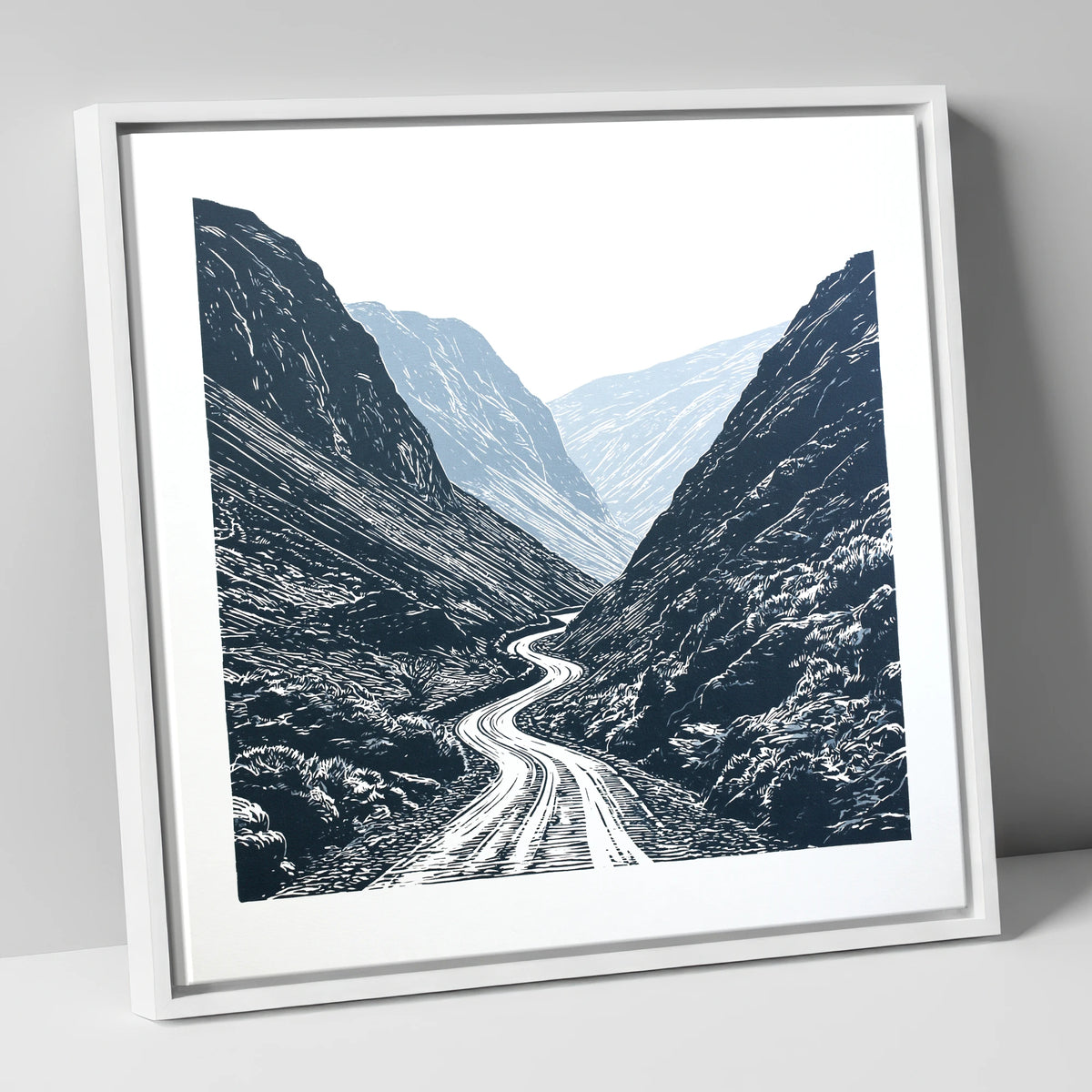 Honister Pass in Bold Navy lake district valley canvas wall art in white frame