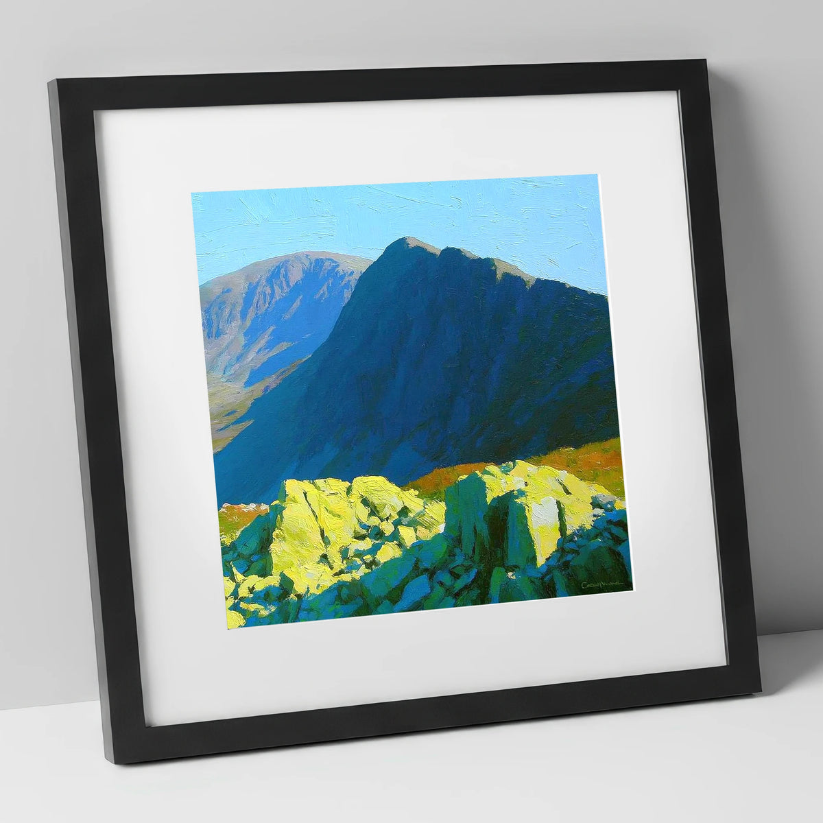 Sunlit Rocks on Great Carrs lake district fell art print in black frame