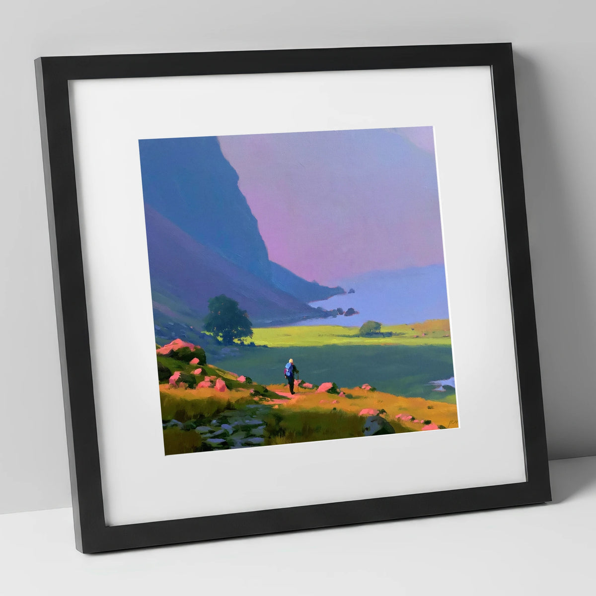 Lone Hiker Beneath Indigo Fells lake district walking art print in black frame