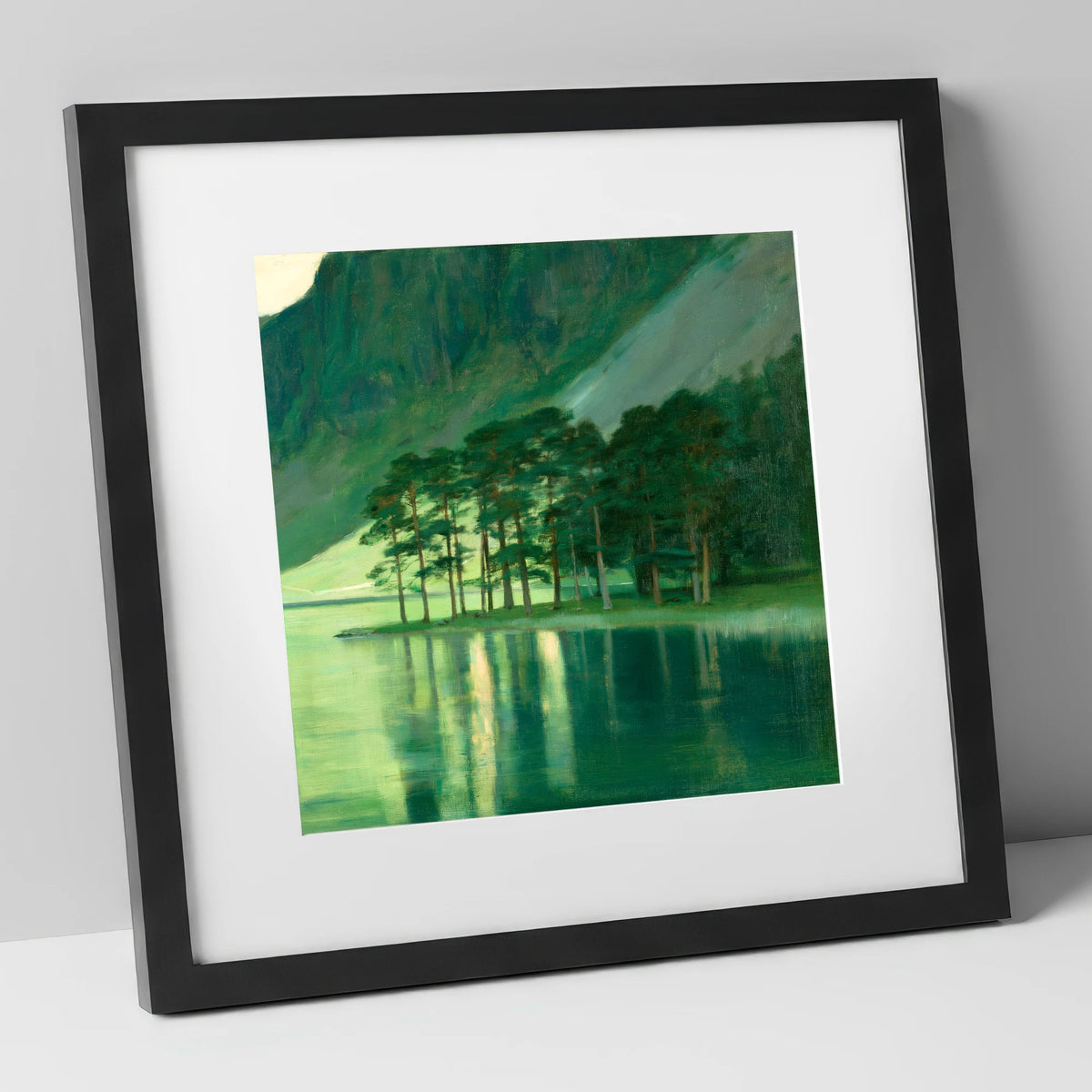 Buttermere Pines in Emerald Light lake district lake art print in black frame
