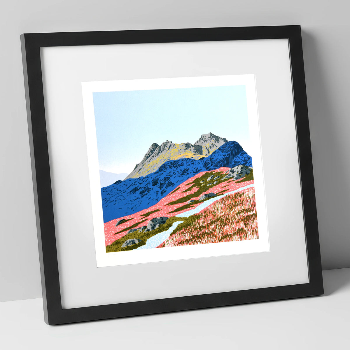 Langdale Pikes in Vivid Coral lake district fell art print in black frame