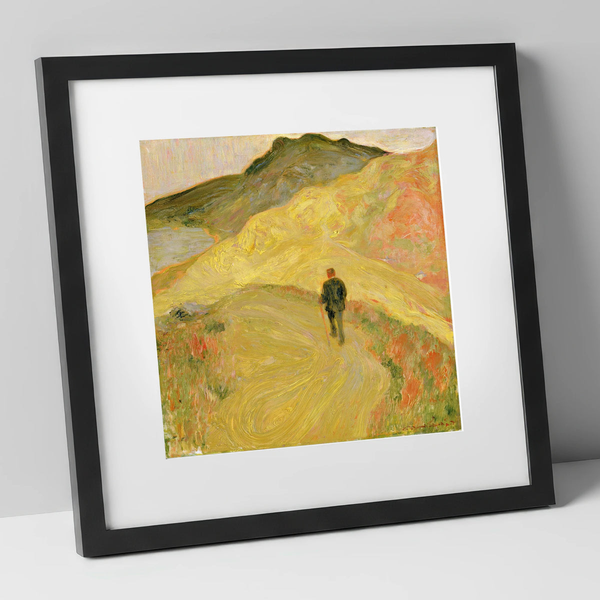 Lone Hiker on Golden Fells lake district walking art print in black frame