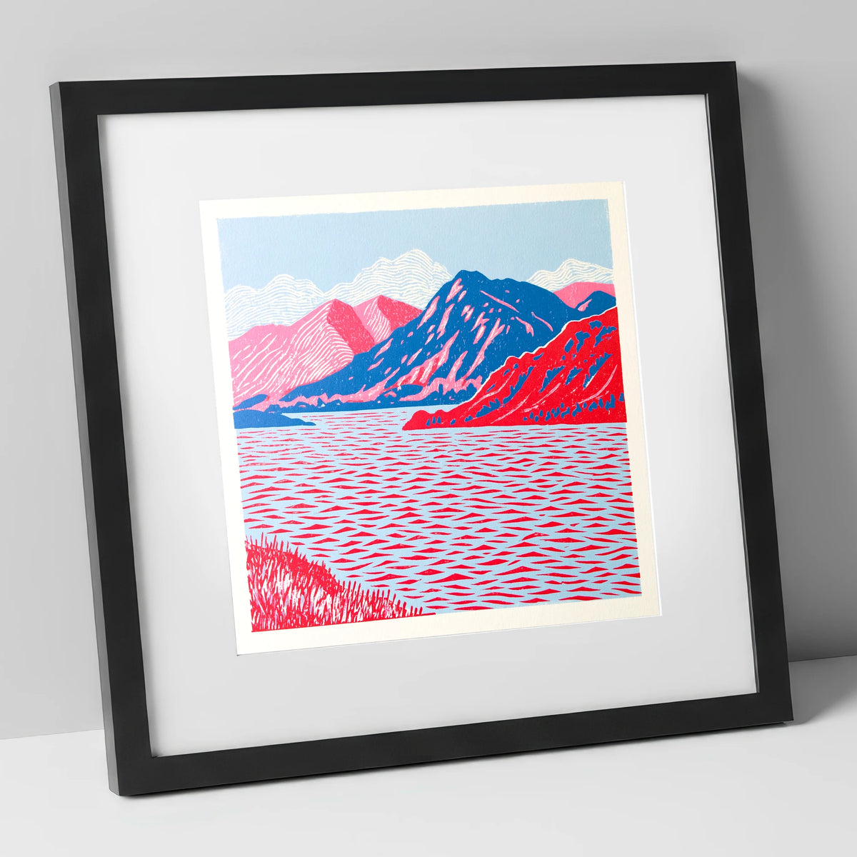 Ullswater in Vivid Red and Blue lake district lake art print in black frame