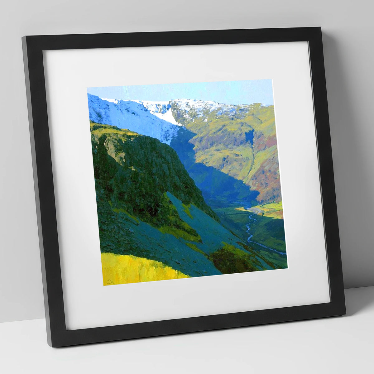Vibrant Tarn Crag in Snow lake district fell art print in black frame