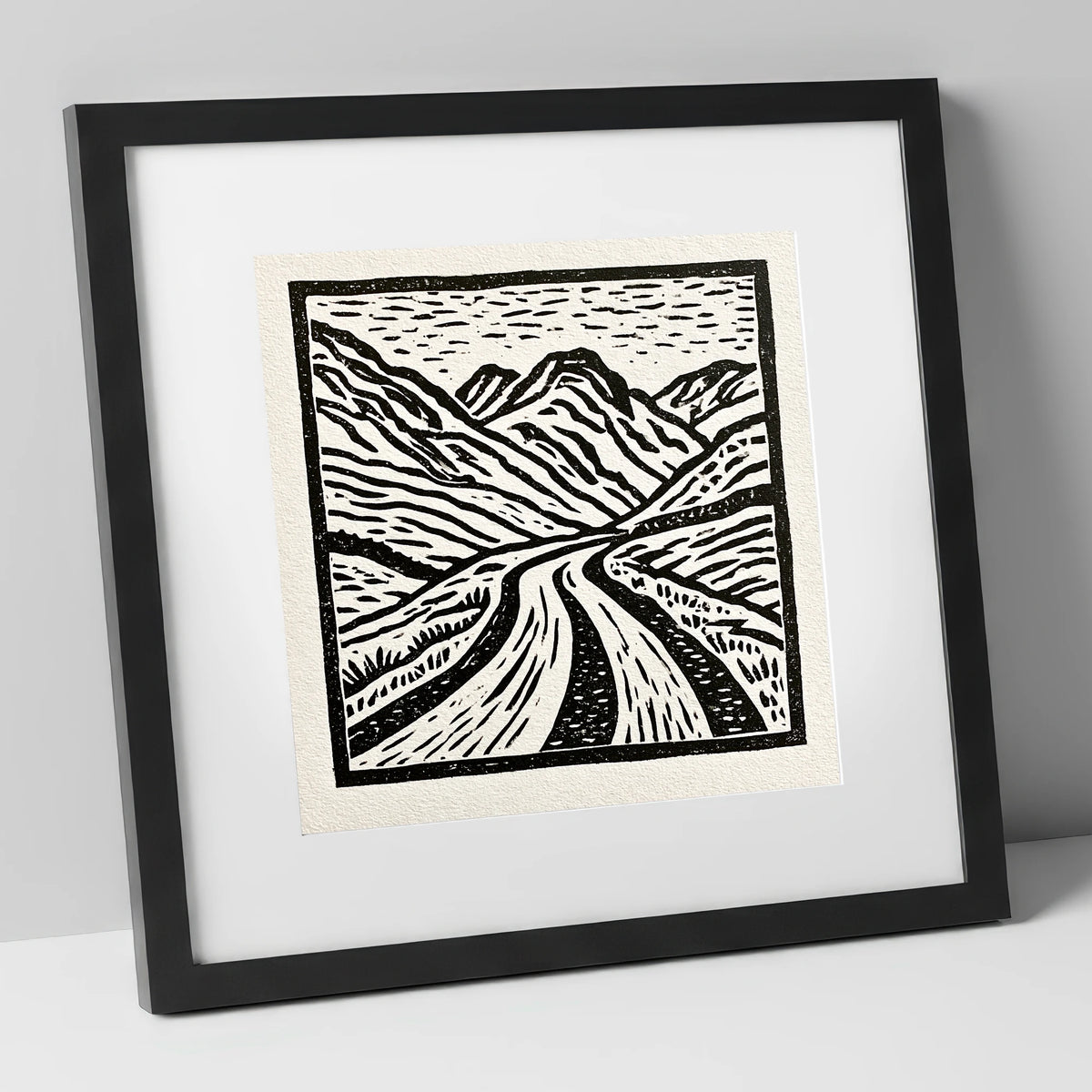 Hardknott Pass in Stark Monochrome lake district valley art print in black frame