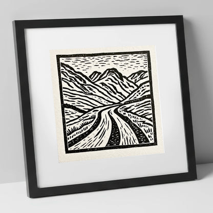 Hardknott Pass in Stark Monochrome lake district valley art print in black frame