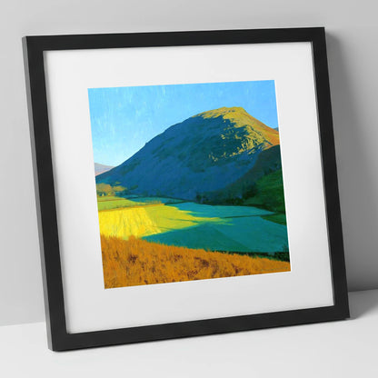 Sunlit Fields Below Low Fell lake district fell art print in black frame