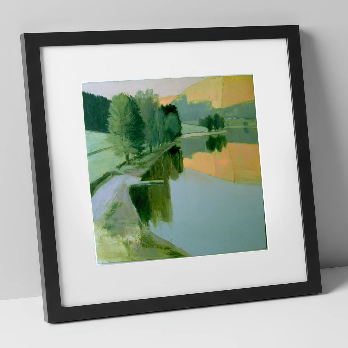 Still Lake in Apricot Dawn lake district lake art print in black frame