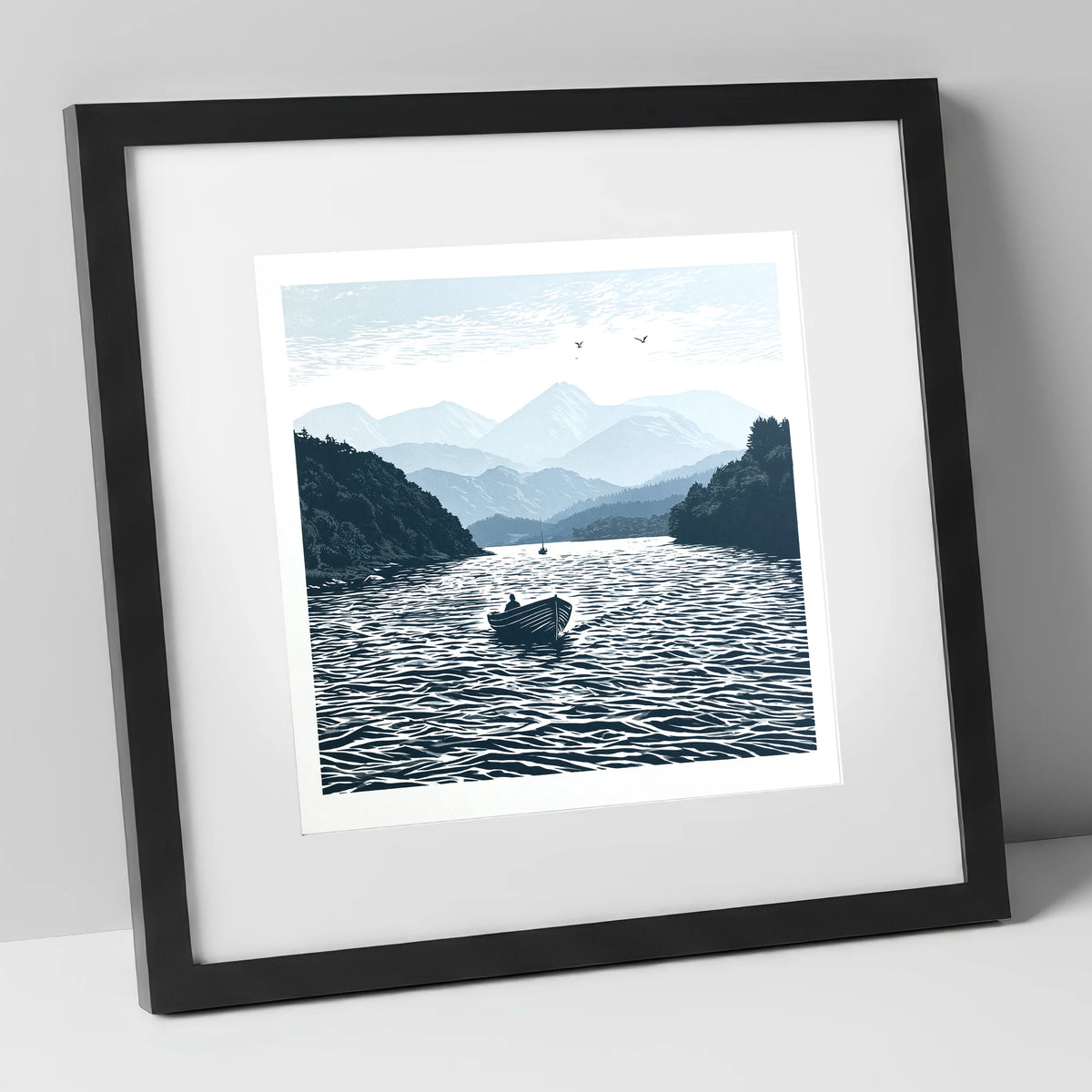 Coniston Water in Deep Navy lake district lake art print in black frame