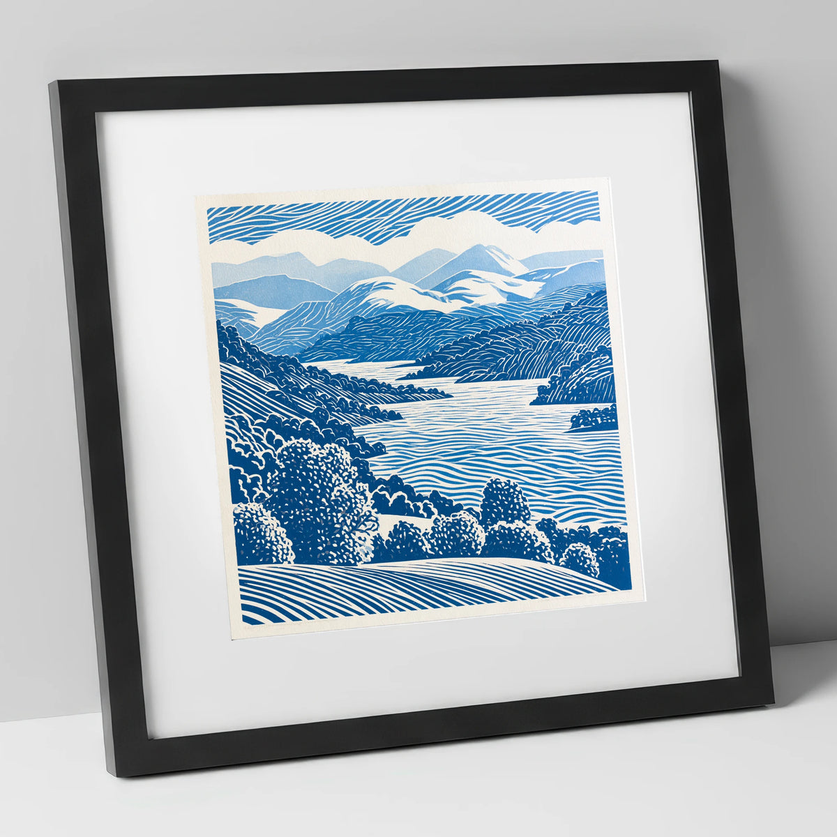 Coniston Water in Cobalt Blue lake district lake art print in black frame