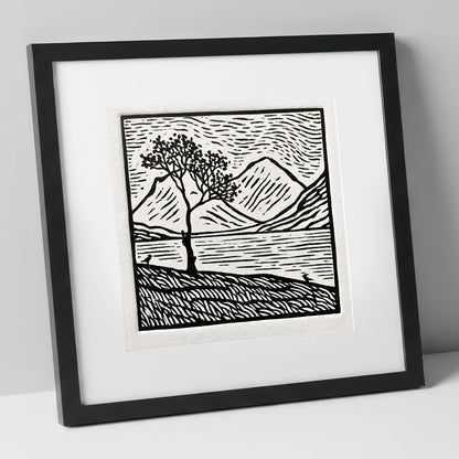Monochrome Buttermere and Lone Tree lake district lake art print in black frame