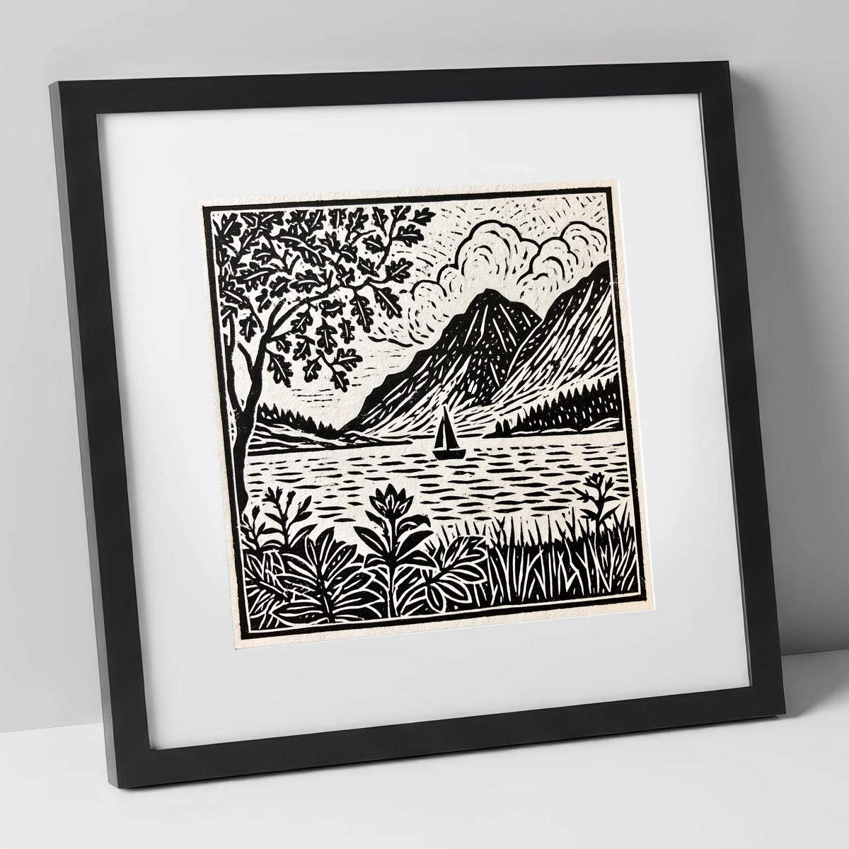 Monochrome Ennerdale Fells and Sailboat lake district valley art print in black frame