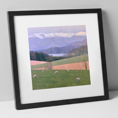 Hawkshead Pastures and Snowy Fells lake district village art print in black frame