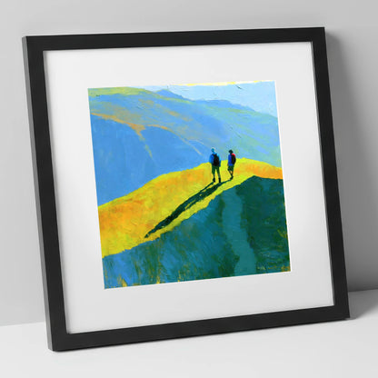 Fell Walkers on a Vibrant Sunlit Ridge lake district fell art print in black frame