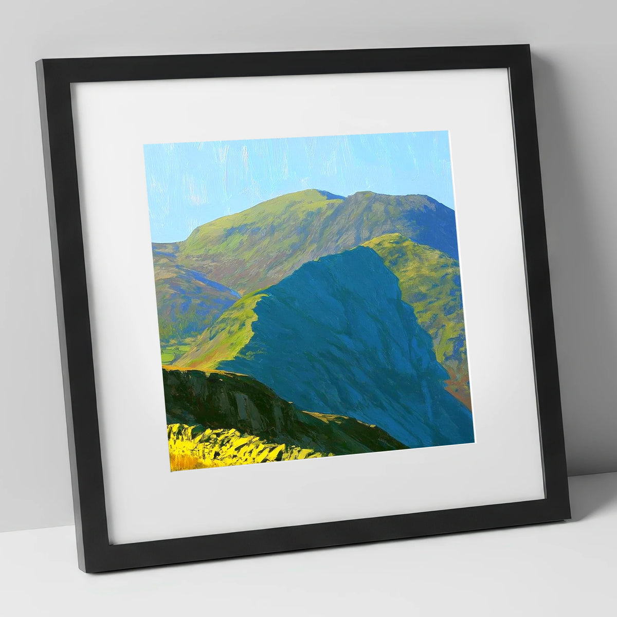 Sunlit Crags of Wetherlam Ridge lake district fell art print in black frame