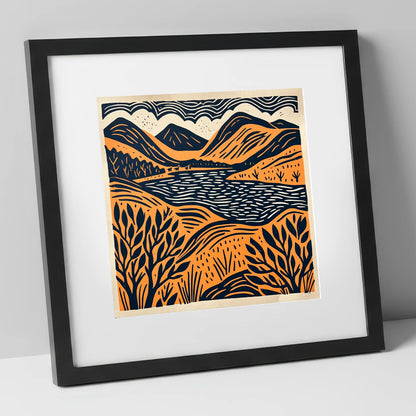 Terracotta and Navy Lake Fells lake district lake art print in black frame
