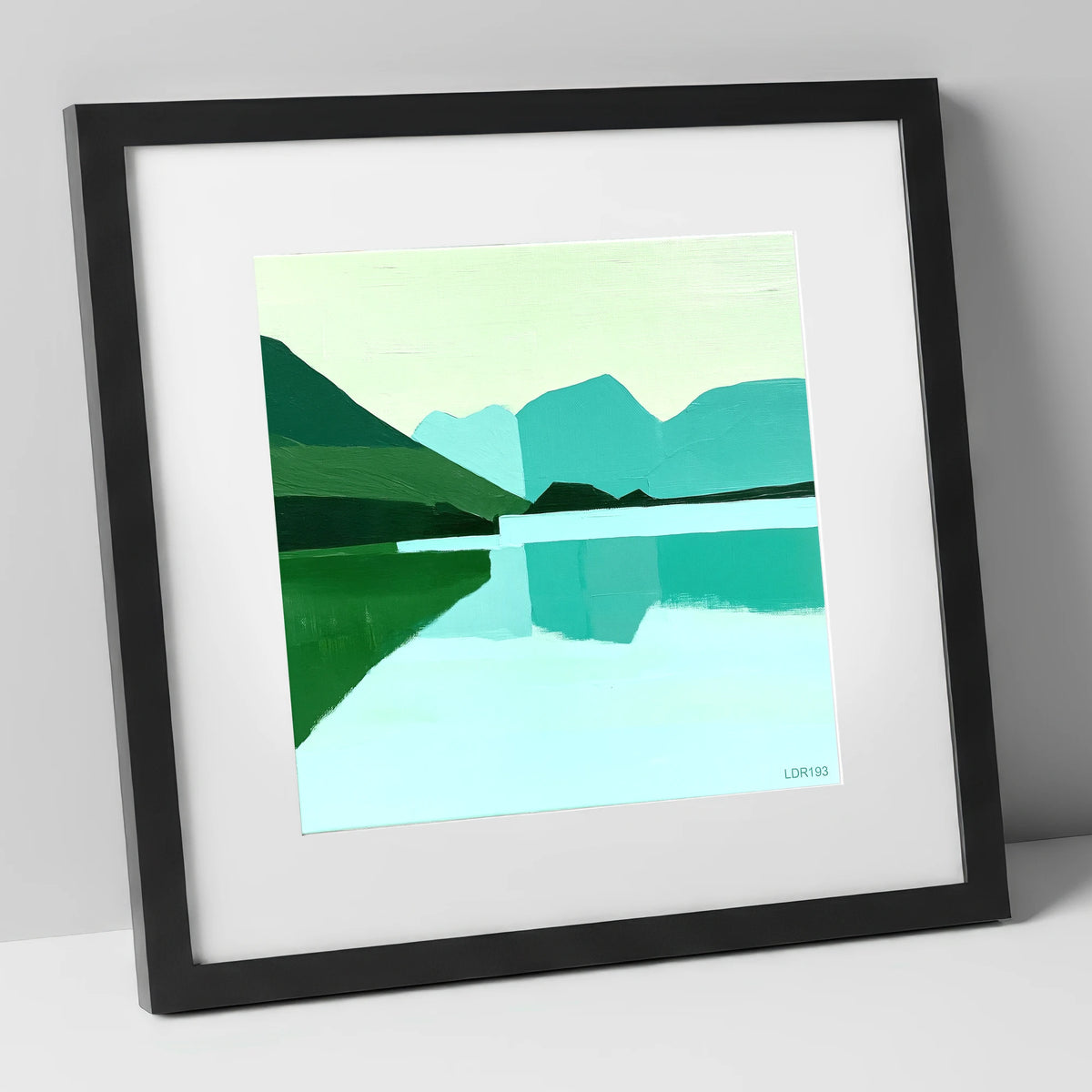 Loweswater Reflections in Bold Teal lake district lake art print in black frame