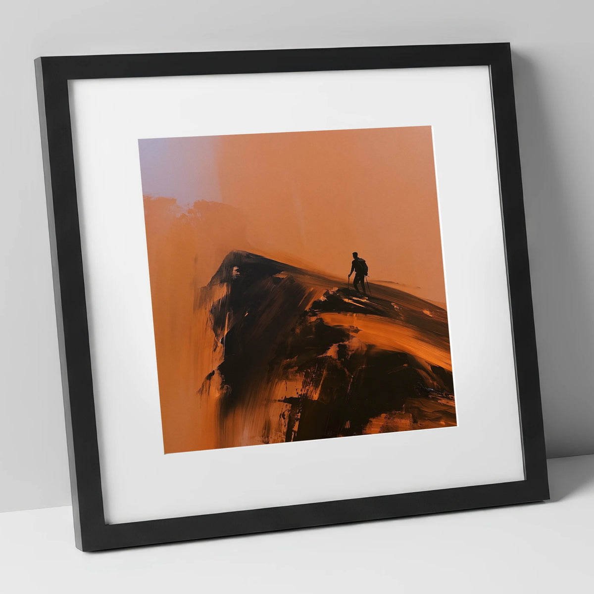 Striding Edge Silhouette in Amber lake district walking art print in black frame