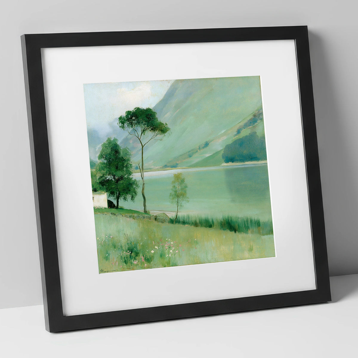 Buttermere in Soft Sage Green lake district lake art print in black frame