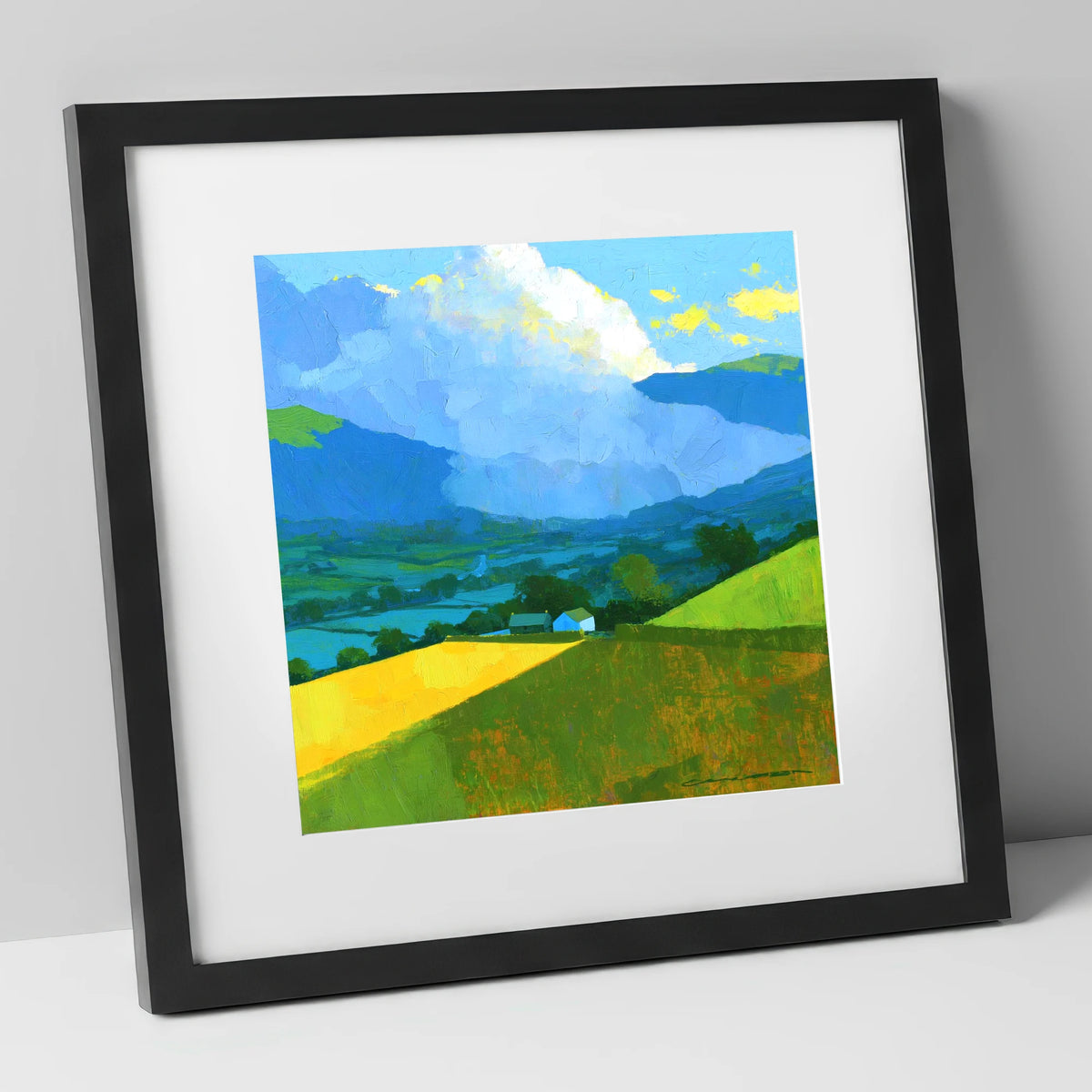 Vibrant Valley Fields and Towering Clouds lake district sky art print in black frame