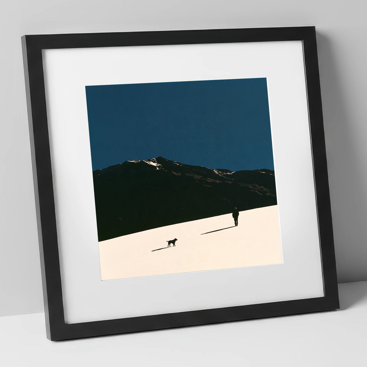 Silhouetted Dog Walker on Skiddaw gifts for dog walkers art print in black frame