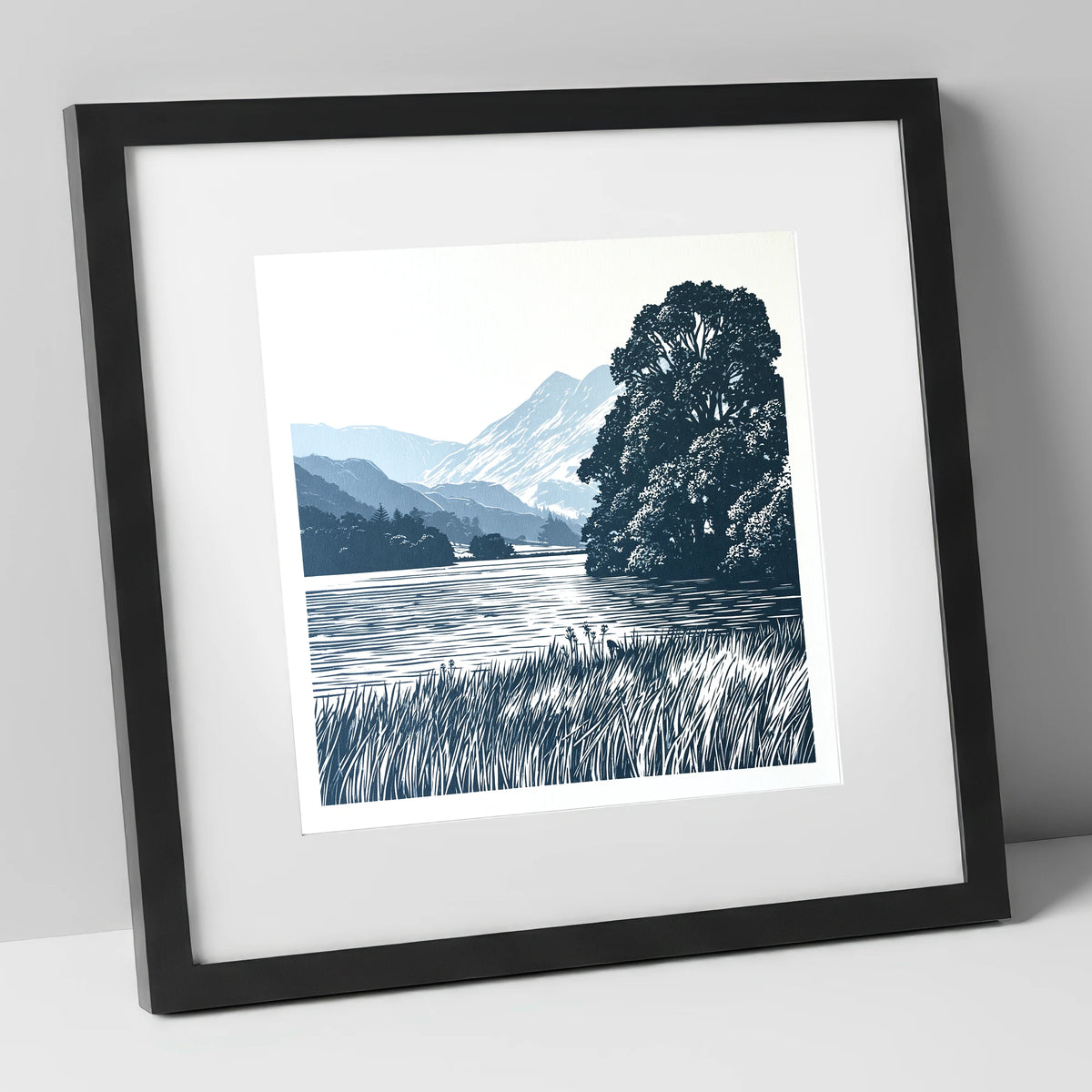 Grasmere Lake in Navy Blue lake district lake art print in black frame
