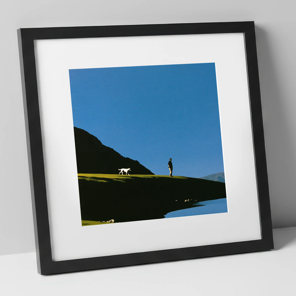 Silhouetted Glenridding Walker and Dog gifts for dog walkers art print in black frame