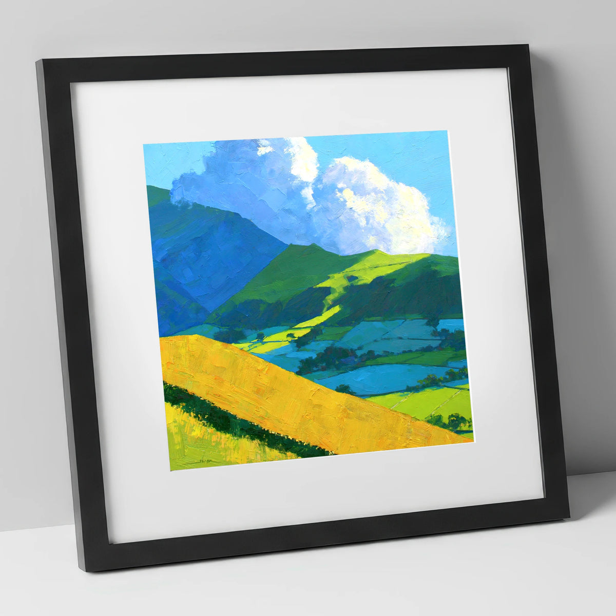 Sunlight and Shadow over Lakeland Fells lake district fell art print in black frame