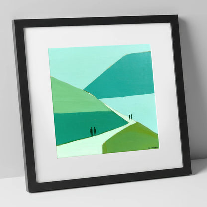 Walkers on Teal Mountain Path lake district walking art print in black frame