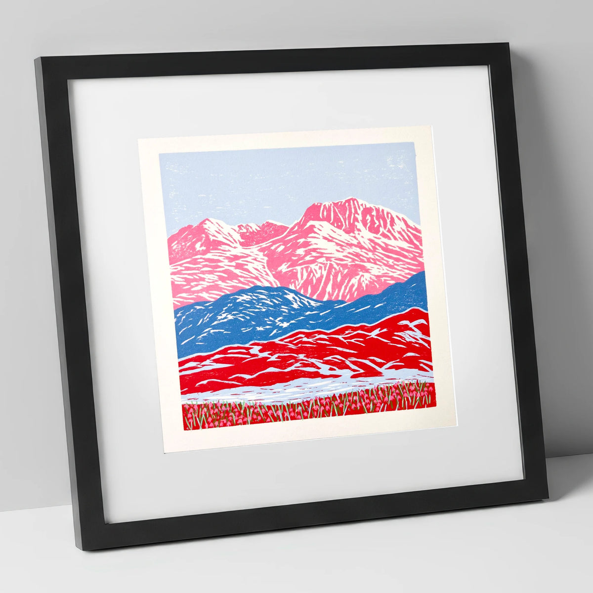 Bowfell in Bold Pink and Blue lake district fell art print in black frame