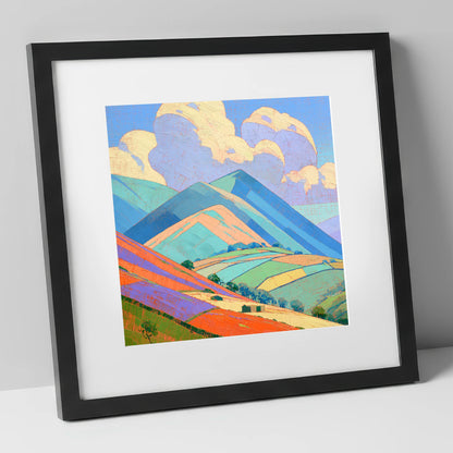 Turquoise and Orange Rolling Fells lake district fell art print in black frame