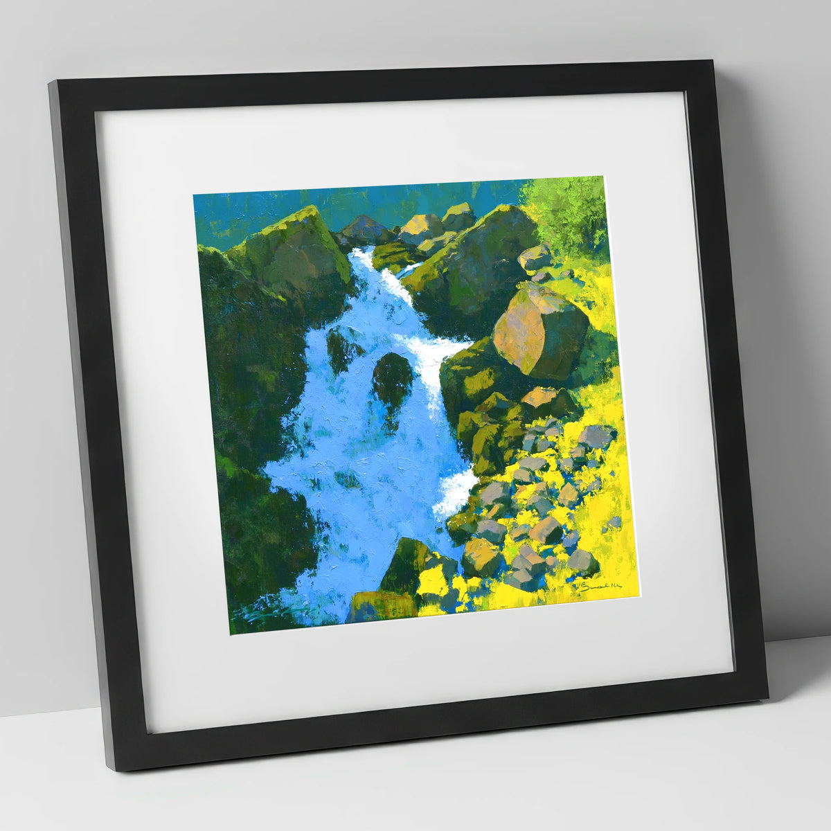 Vibrant Ghyll Waterfall and Sunlit Rocks lake district waterfall art print in black frame