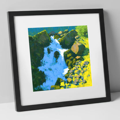 Vibrant Ghyll Waterfall and Sunlit Rocks lake district waterfall art print in black frame