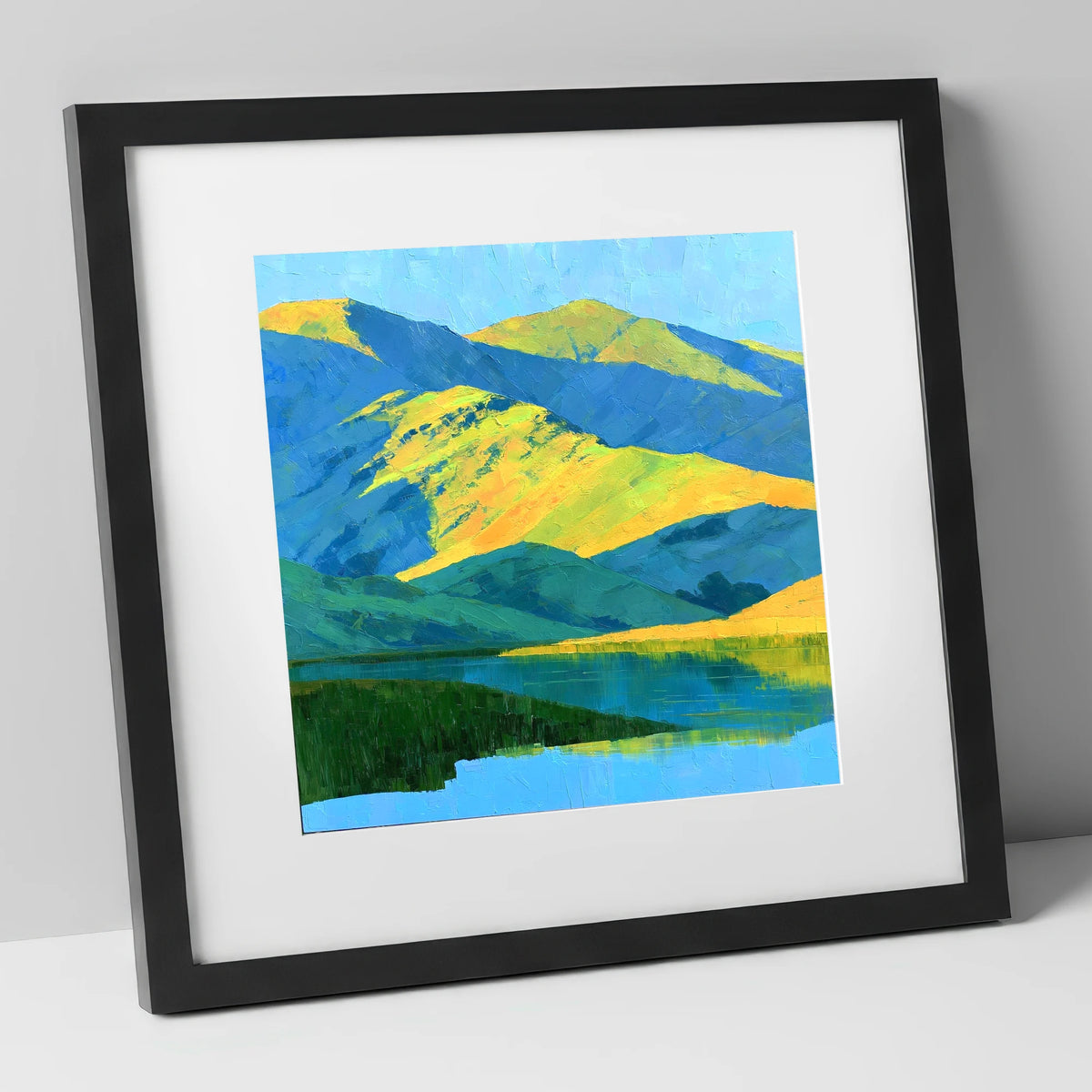 Sunlit Fells and Deep Blue Shadows lake district sky art print in black frame