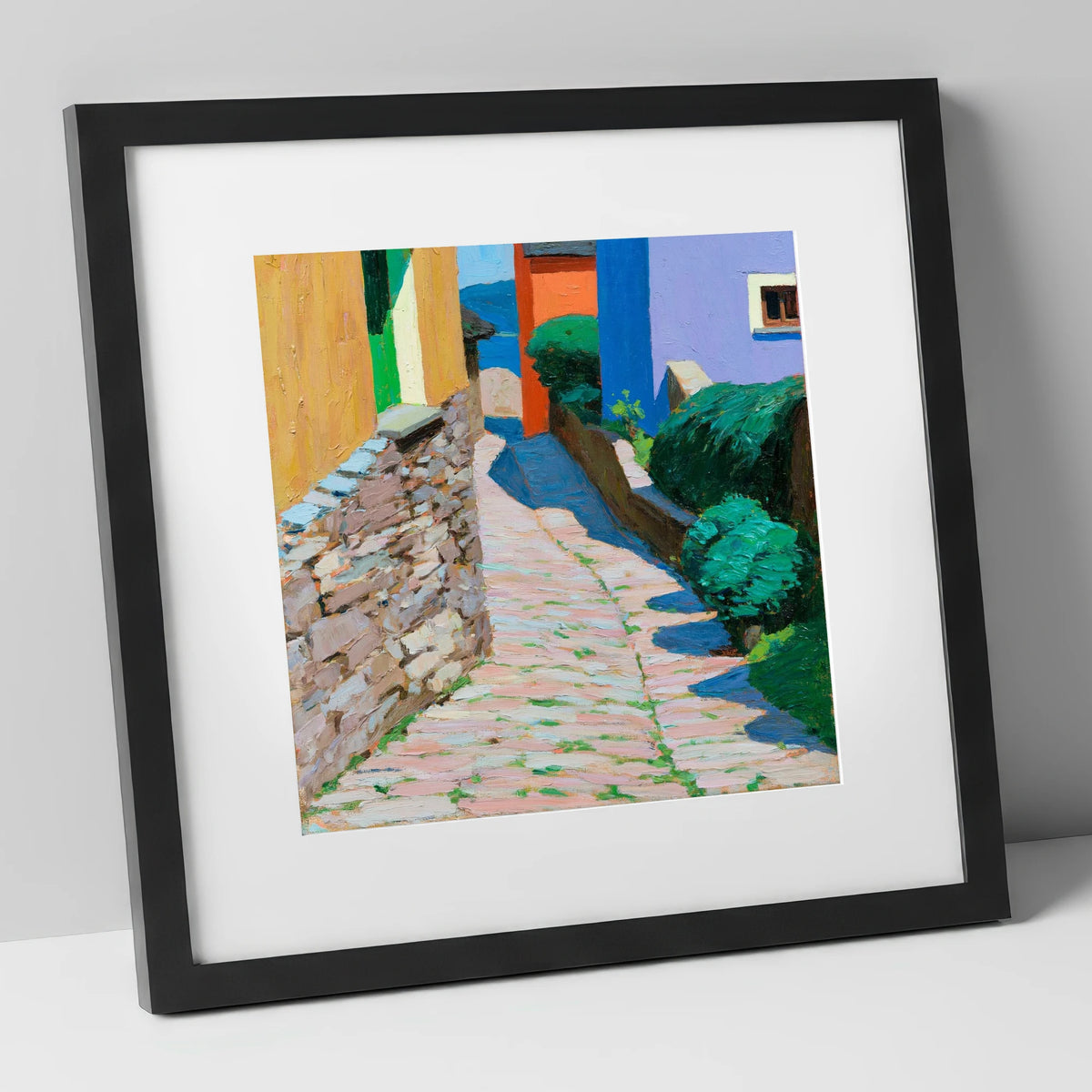 Colourful Cobbled Village Street lake district village art print in black frame