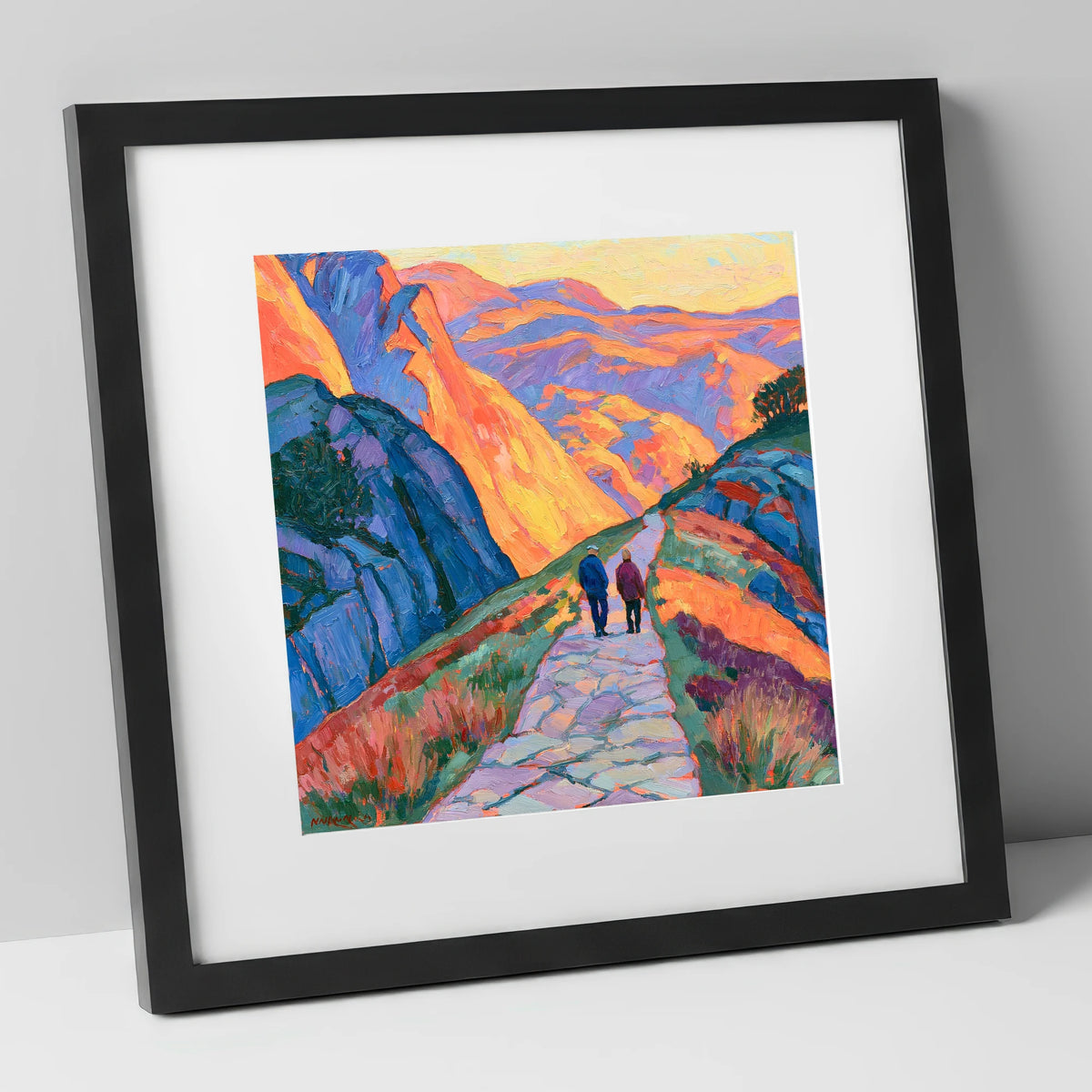 Walkers on an Amber Mountain Path lake district walking art print in black frame