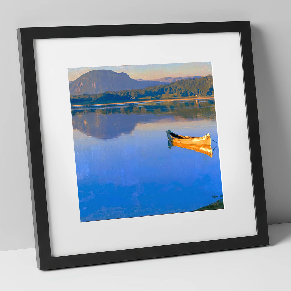 Sunlit Canoe on Lake Windermere lake district lake art print in black frame