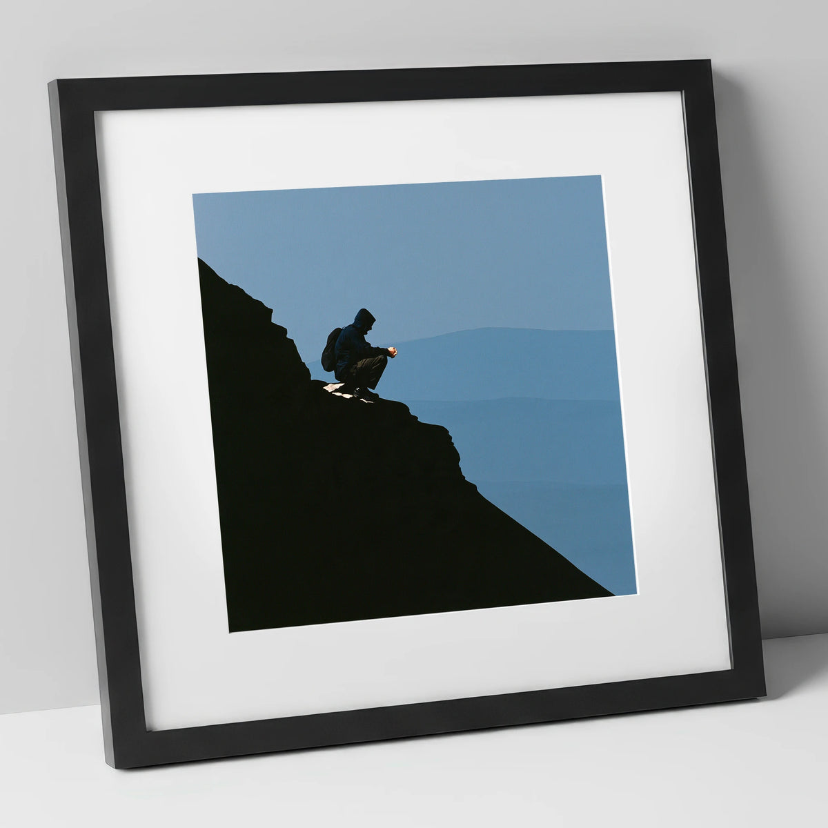 Blencathra Walker in Dramatic Silhouette lake district fell art print in black frame
