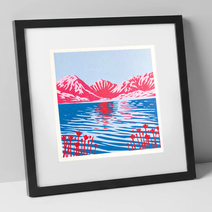 Vivid Fells Over Still Water lake district lake art print in black frame