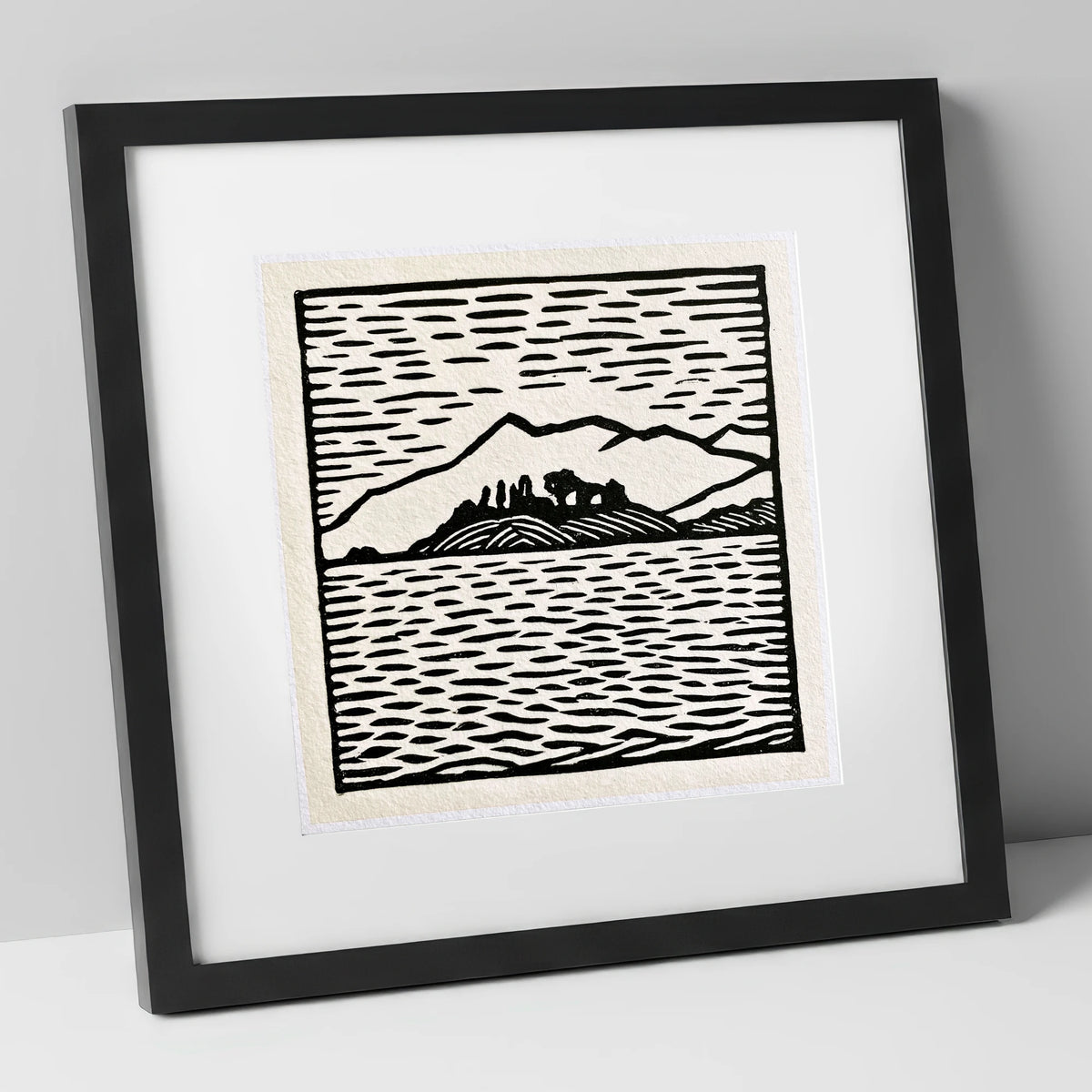 Bold Monochrome Derwentwater Island lake district lake art print in black frame