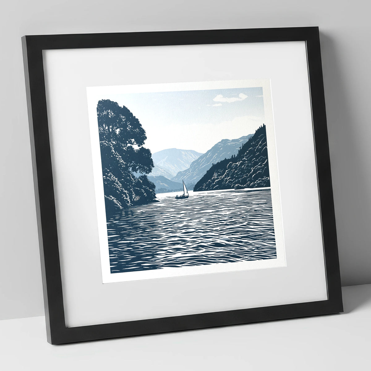 Ullswater Sailboat in Navy Blue lake district lake art print in black frame