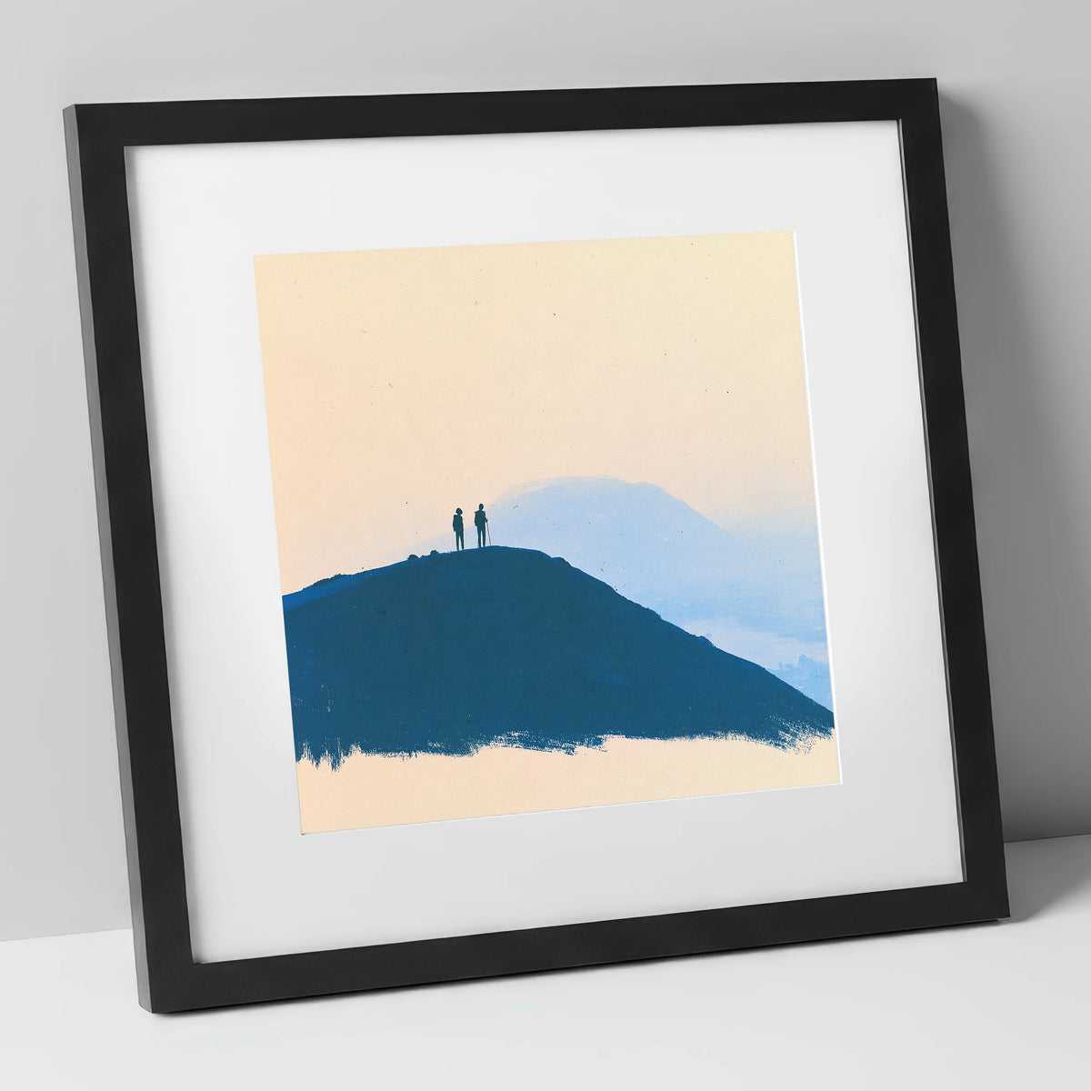 Silhouetted Hikers on Blue Fells lake district fell art print in black frame
